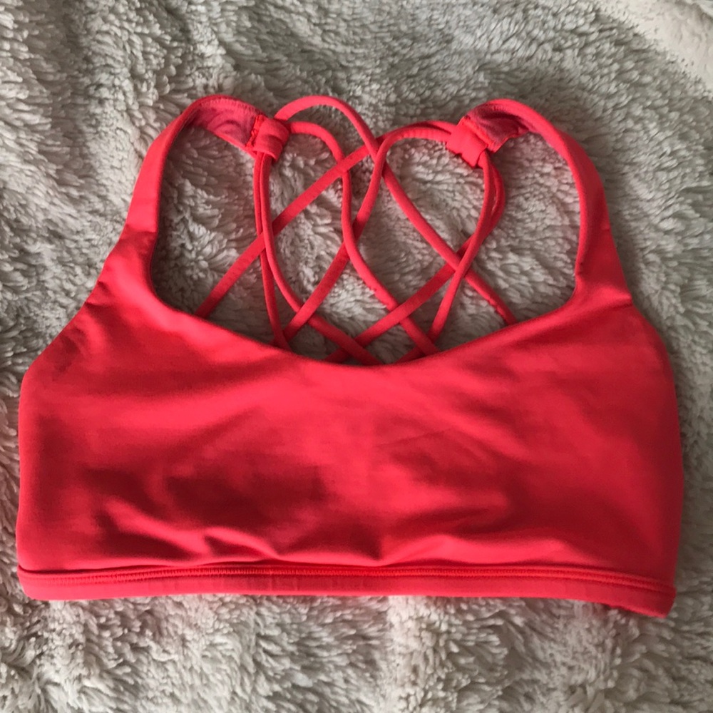 Coral color sports bra